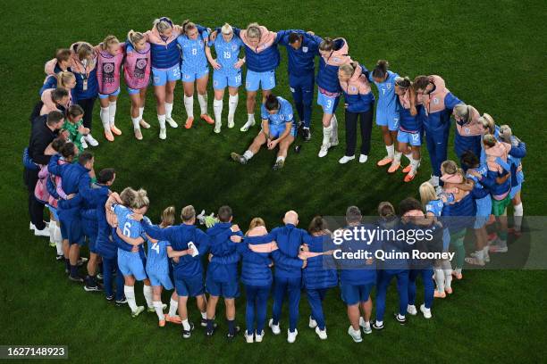 England players and staff huddle after the team’s defeat following during the FIFA Women's World Cup Australia & New Zealand 2023 Final match between...