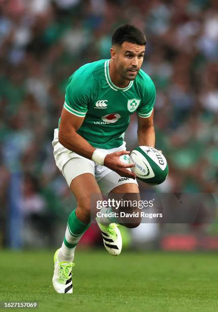 Conor Murray of Ireland runs with the ball during the Summer International match between Ireland and England at the Aviva Stadium on August 19, 2023...