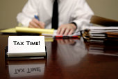 Tax Time Man at Desk