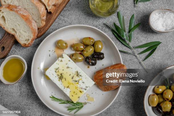 feta cheese, olives and ciabatta bread and olive oil - greek food stock pictures, royalty-free photos & images