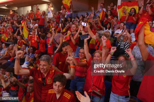 Fans cheer Spain's victory while watching a live transmission on a giant screen the final of the FIFA Women's World Cup 2023 between England and...