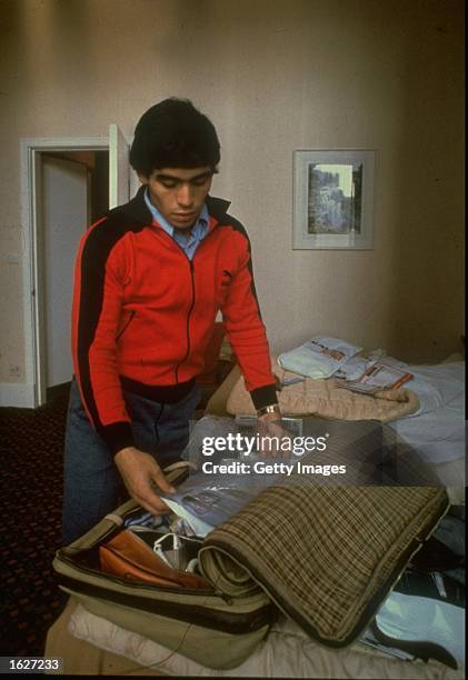 Young Diego Maradona of Argentina packs his suitcase. \ Mandatory Credit: Allsport UK /Allsport