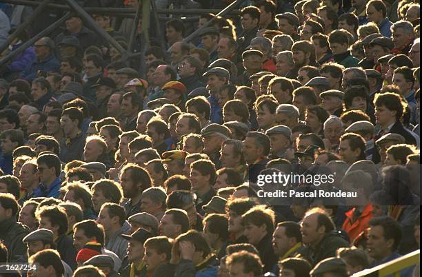 General view of supporters on the terraces watching the League Division One match between Watford and Everton at the Vicarage Road Stadium in...