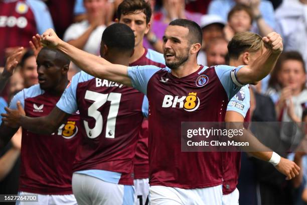 John McGinn of Aston Villa celebrates after scoring the team's first goal during the Premier League match between Aston Villa and Everton FC at Villa...