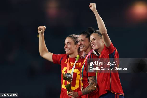 Alexia Putellas, Jennifer Hermoso and Irene Paredes of Spain celebrate with the FIFA Women's World Cup Trophy after the team's victory in the FIFA...