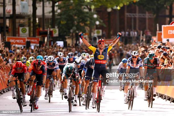 Mads Pedersen of Denmark and Team Lidl-Trek celebrates at finish line as stage winner ahead of Arnaud Démare of France and Team Arkea - Samsic, Elia...