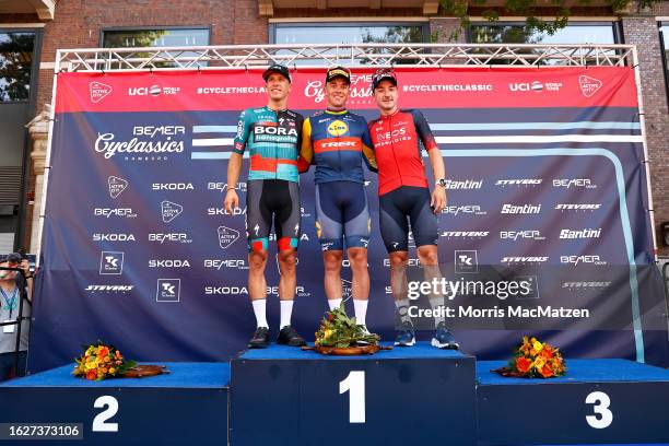Danny Van Poppel of The Netherlands and Team Bora - Hansgrohe on second place, race winner Mads Pedersen of Denmark and Team Lidl-Trek and Elia...