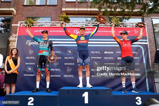 Danny Van Poppel of The Netherlands and Team Bora - Hansgrohe on second place, race winner Mads Pedersen of Denmark and Team Lidl-Trek and Elia...