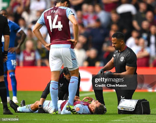 Philippe Coutinho of Aston Villa receives medical treatment during the Premier League match between Aston Villa and Everton FC at Villa Park on...