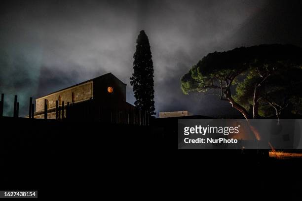 Nighttime view of the Santa Maria di Cerrate Abbey enveloped in fog, located in Cerrate, Italy, taken on August 25, 2023. The abbey is one of the...