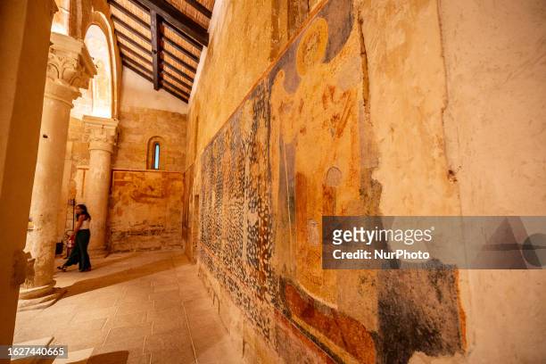 Interior view of the Santa Maria di Cerrate Abbey enveloped in fog, located in Cerrate, Italy, taken on August 25, 2023. The abbey is one of the most...
