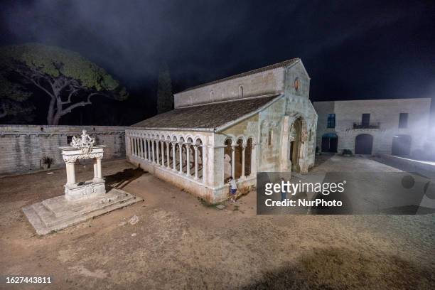 Nighttime view of the Santa Maria di Cerrate Abbey, located in Cerrate, Italy, taken on August 25, 2023. The abbey is one of the most significant...