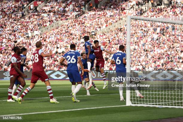 Nayef Aguerd of West Ham United scores the team's first goal during the Premier League match between West Ham United and Chelsea FC at London Stadium...