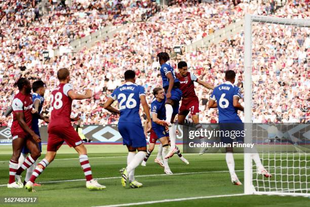 Nayef Aguerd of West Ham United scores the team's first goal during the Premier League match between West Ham United and Chelsea FC at London Stadium...