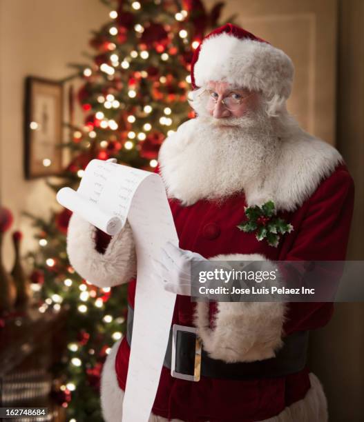 santa reading list - santa stock pictures, royalty-free photos & images