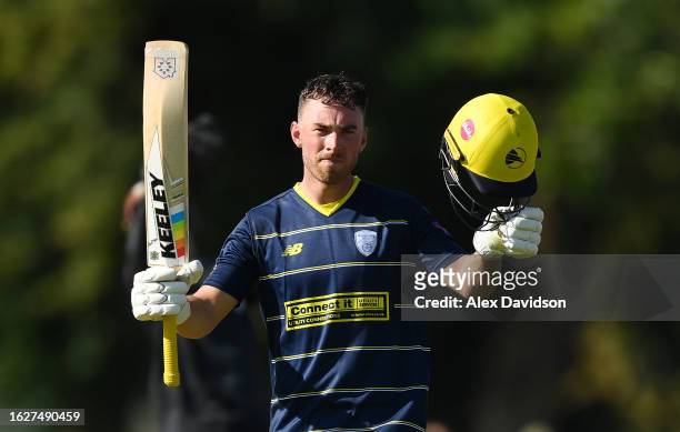 Joe Weatherley of Hampshire celebrates reaching his century during the Metro Bank One Day Cup match between Surrey and Hampshire at Guildford Cricket...