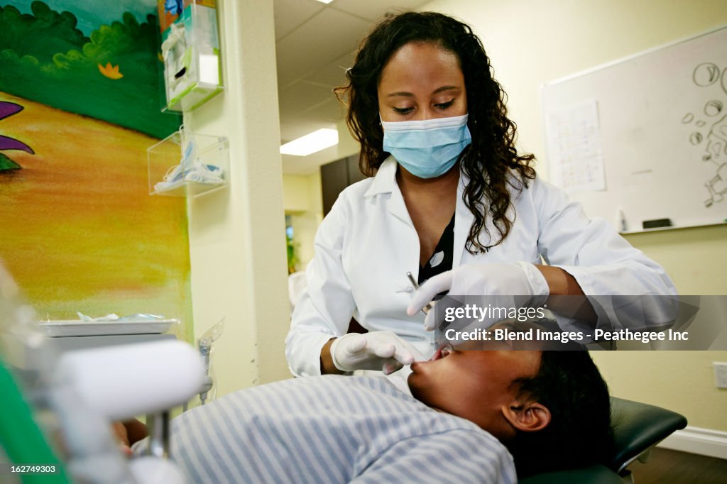 Dentist and patient in dental office