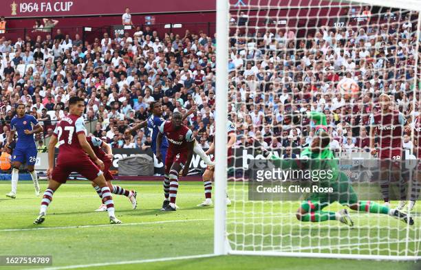 Carney Chukwuemeka of Chelsea scores the team's first goal during the Premier League match between West Ham United and Chelsea FC at London Stadium...