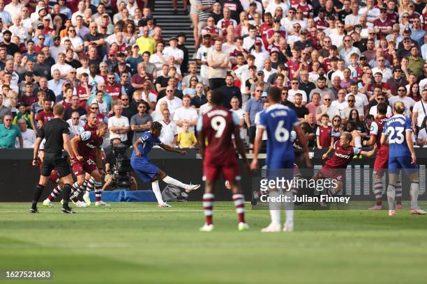 Carney Chukwuemeka of Chelsea scores the team's first goal during the Premier League match between West Ham United and Chelsea FC at London Stadium...