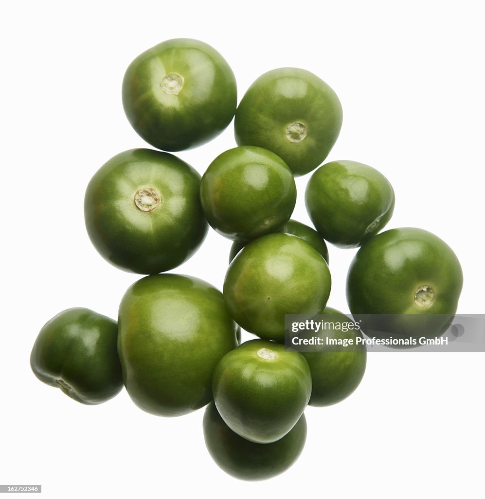 Tomatillos on white background
