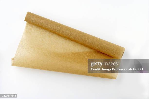 roll of baking paper - wachspapiere stock-fotos und bilder