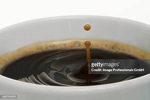 coffee drops in cup - coffee drip ストックフォトと画像
