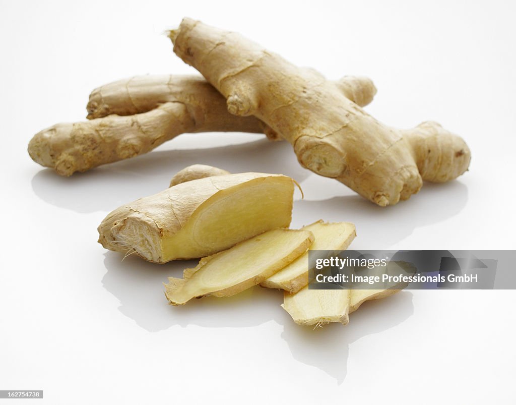 Fresh ginger, whole and sliced