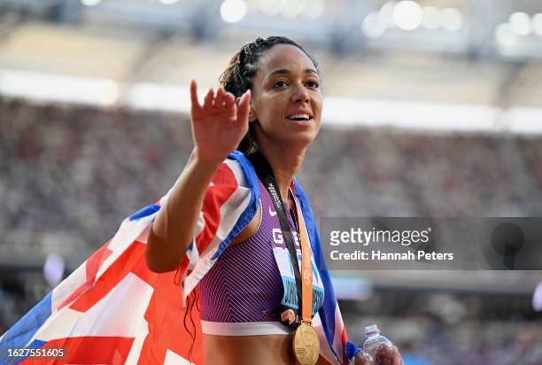 Katarina Johnson-Thompson of Team Great Britain celebrates after winning gold in the Women's 800m Heptathlon final during day two of the World...