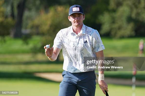 Nick Dunlap of the United States acknowledges fans after a putt on ...