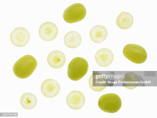 green grapes, whole and sliced - white grape stock pictures, royalty-free photos & images