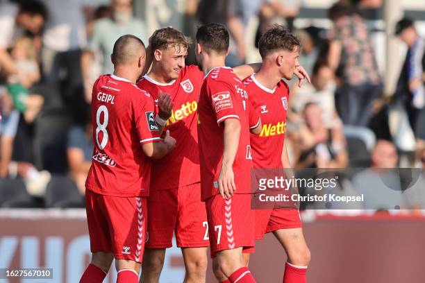 The team of Regensburg celebrates the 2-1 victory after the 3. Liga match between SC Verl and Jahn Regensburg at Sportclub Arena on August 20, 2023...
