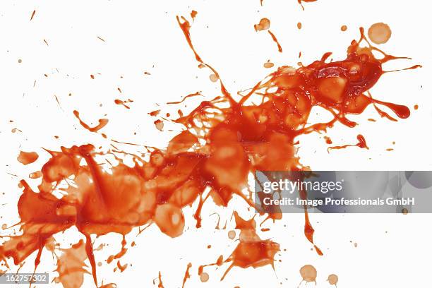 squirted tomato sauce against white background - sauce tomate stock pictures, royalty-free photos & images