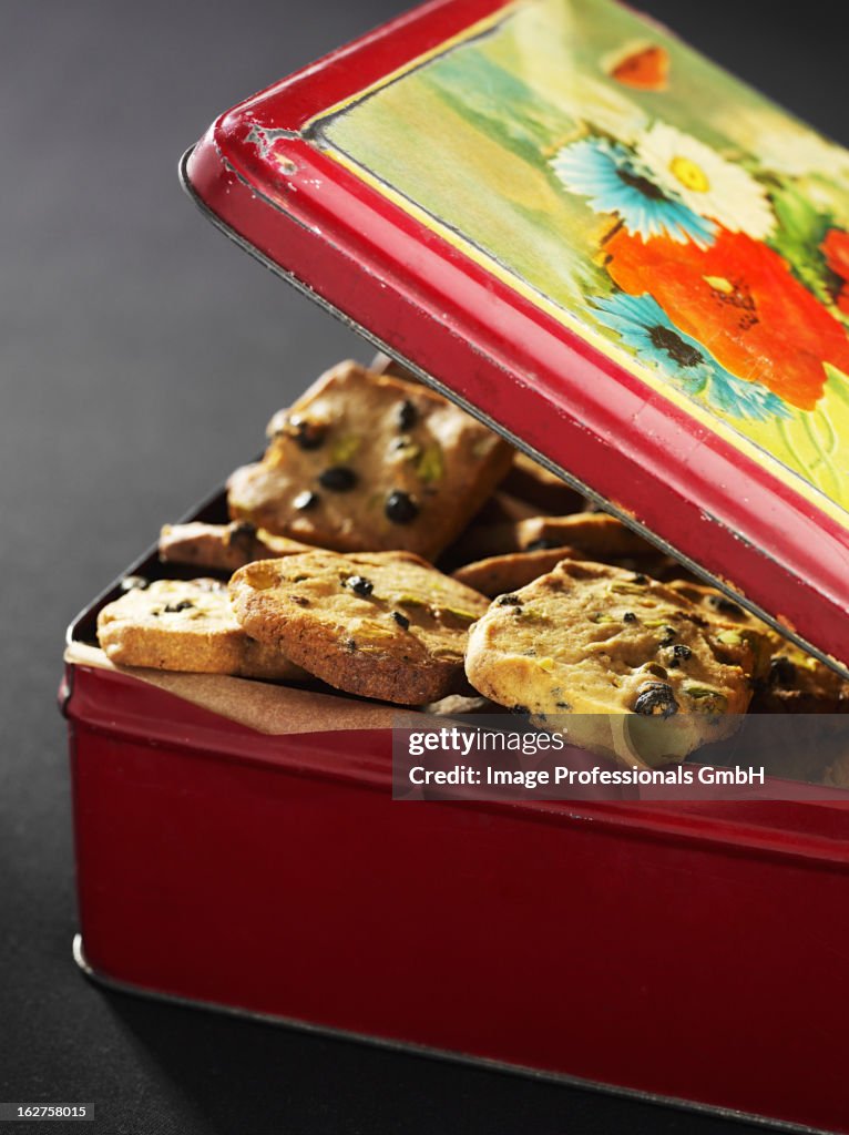 Biscuit tin filled with chocolate chip cookies