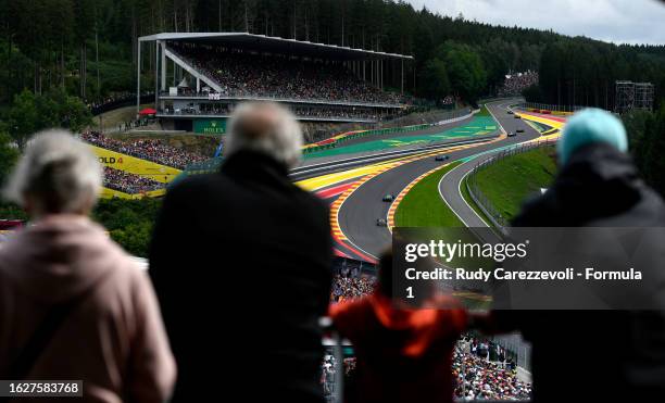 Lance Stroll of Canada driving the Aston Martin AMR23 Mercedes leads George Russell of Great Britain driving the Mercedes AMG Petronas F1 Team W14 on...