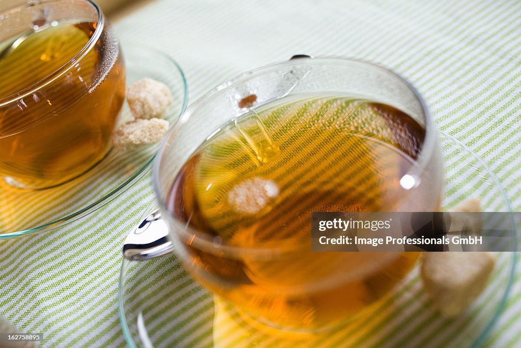 Cups of tea and sugar cubes
