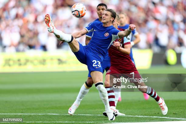 Conor Gallagher of Chelsea controls the ball whilst under pressure from James Ward-Prowse of West Ham United during the Premier League match between...