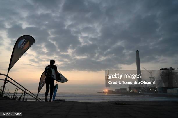 Surfer takes part in the Iwasawa Surfing Games at Iwasawa beach on August 20, 2023 in Naraha, Fukushima Prefecture, Japan. A total of 189 surfers...