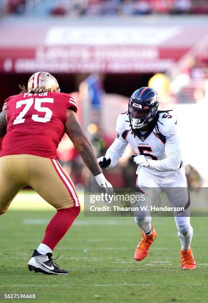 Randy Gregory of the Denver Broncos rushes up against Matt Pryor of the San Francisco 49ers during the second quarter at Levi's Stadium on August 19,...