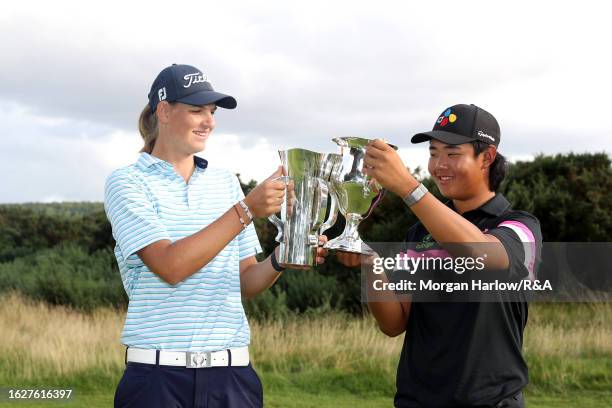 Helen Briem of Germany celebrates with Kris Kim of England as they pose with their Trophies after the Final on Day Six of the R&A Girls' Amateur...