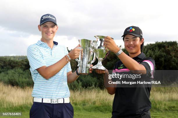 Helen Briem of Germany celebrates with Kris Kim of England as they pose with their Trophies after the Final on Day Six of the R&A Girls' Amateur...