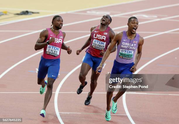 Noah Lyles of Team United States, Christian Coleman of Team United States, and Zharnel Hughes of Team Great Britain react after competing in the...