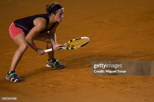 Lourdes Dominguez from Spain in action during a match against Italy«s Flavia Pennetta during a match as part of the Mexican Tennis Open Acapulco 2013...