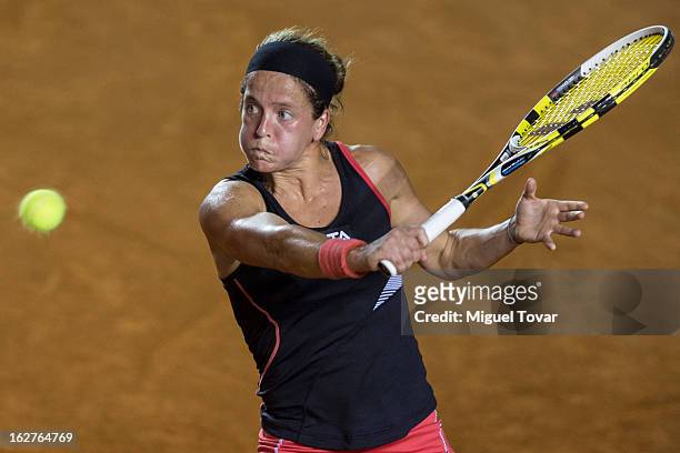 Lourdes Dominguez from Spain in action during a match against Italy«s Flavia Pennetta during a match as part of the Mexican Tennis Open Acapulco 2013...