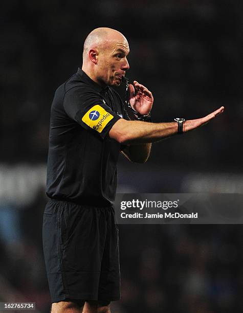 Referee Howard Webb blows his whistle during the Barclays Premier League match between West Ham United and Tottenham Hotspur at the Boleyn Ground on...