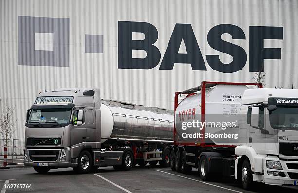 Trucks are seen outside a distribution warehouse at BASF SE's headquarters in Ludwigshafen, Germany, on Tuesday, Feb. 26, 2013. BASF SE forecast...