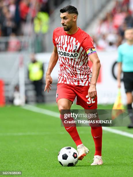 Freiburg's Italian midfielder Vincenzo Grifo controls the ball during the German first division Bundesliga football match between SC Freiburg and...