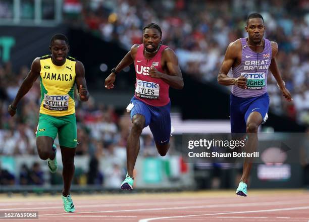 Oblique Seville of Team Jamaica, Noah Lyles of Team United States and Zharnel Hughes of Team Great Britain compete in the Men's 100m Final during day...