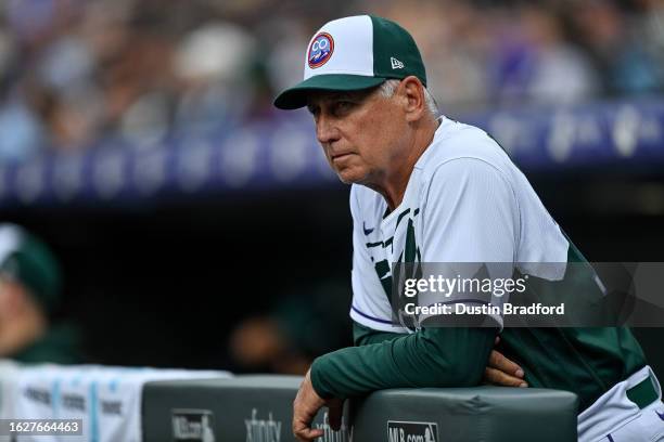 Bud Black of the Colorado Rockies looks on from the dugout in the first inning against the Chicago White Sox at Coors Field on August 19, 2023 in...