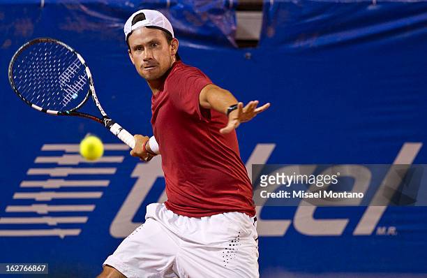 Miguel Angel Reyes of Mexico returns the balll to Leonardo Meyer of Argentina during the ATP Mexican Open Telcel at the Pacific resort on February...