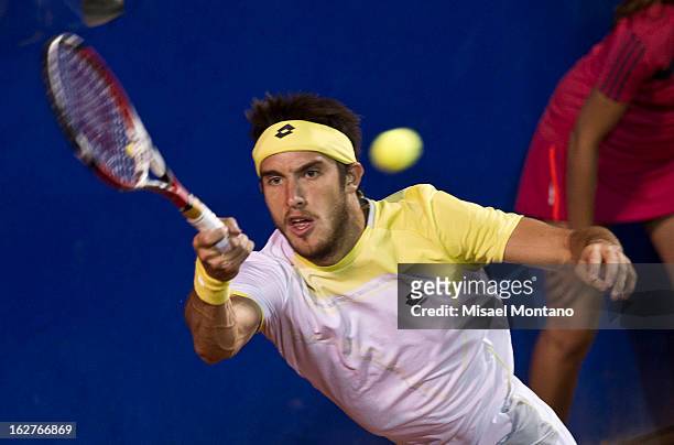 Leonardo Meyer of Argentina returns the balll to Miguel Angel Reyes of Mexico during the ATP Mexican Open Telcel at the Pacific resort on February...
